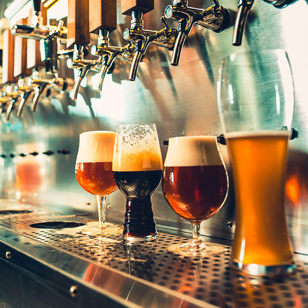 glasses under taps