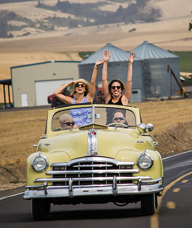 Women in Classic Convertible